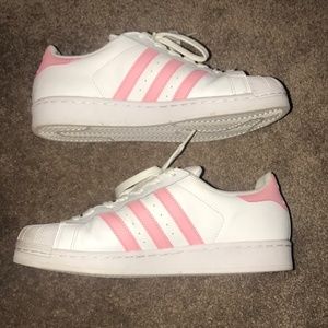 Pink and white Adidas Superstar